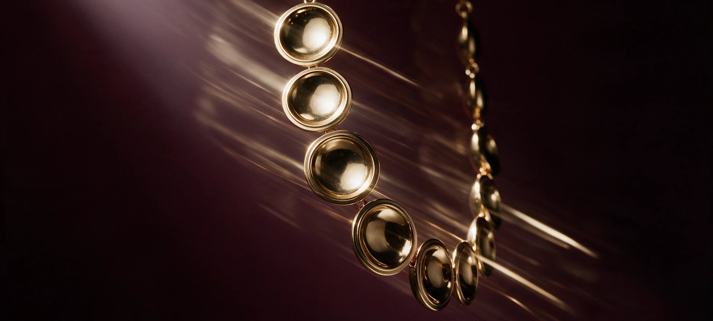 Close view of the gold discs of the Patera Necklace